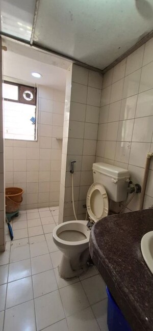 Bathroom in 1 RK Apartment at Piccadilly 1 CHS, Goregaon East – for Rent