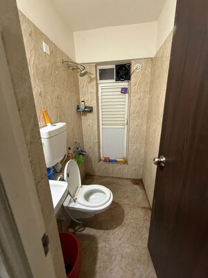 Bathroom in 2 BHK Apartment at Puranik Aldea Anexo, Baner – for Rent
