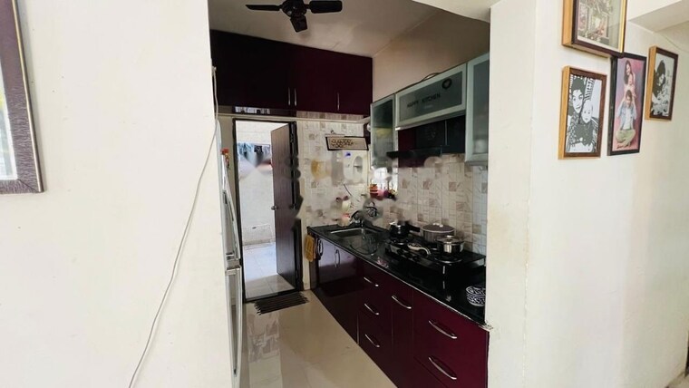 Kitchen, goyal-my-home-mh-14 2.5 Bedroom 870 Sq.Ft. Apartment In Punawale Pune 10294355