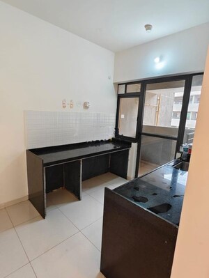 Kitchen in 2 BHK Apartment at Shapoorji Pallonji Vanaha Springs, Bavdhan – for Rent