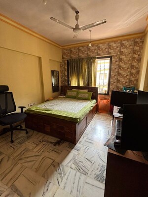 Bedroom in 2 BHK Apartment at Minal Apartments, Andheri East – for Rent