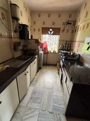 Kitchen in 2 BHK Apartment at Minal Apartments, Andheri East – for Rent