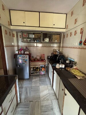 Kitchen in 2 BHK Apartment at Minal Apartments, Andheri East – for Rent