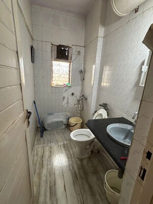 Bathroom in 2 BHK Apartment at Minal Apartments, Andheri East – for Rent
