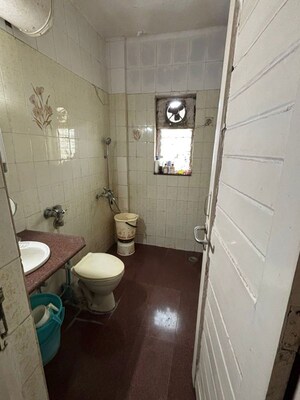 Bathroom in 2 BHK Apartment at Minal Apartments, Andheri East – for Rent