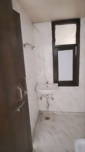 Bathroom in 2 BHK Apartment at Techman Moti Residency, Raj Nagar Extension – for Sale