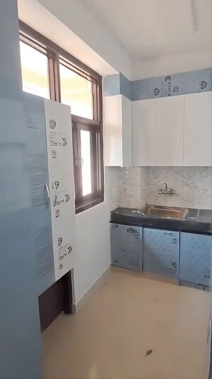 Kitchen in 2 BHK Apartment at Techman Moti Residency, Raj Nagar Extension – for Sale
