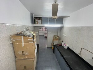 Kitchen in 2 BHK Apartment at Anand Milan Society, Santacruz West – for Rent