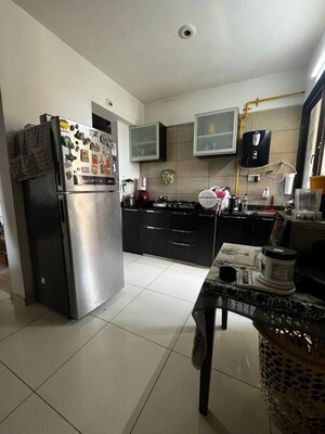 Kitchen in 2 BHK Apartment at Avirat Silver Brook, Sp Ring Road – for Rent