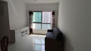 Living Room in 2 BHK Apartment at Kalpataru Immensa B, Kolshet Road – for Rent