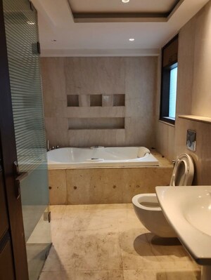 Bathroom in 4 BHK Apartment at Ambience Caitriona, Sector 24 – for Sale