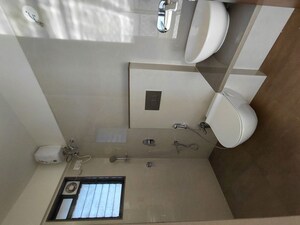 Bathroom in 2 BHK Apartment at Modirealty Vatvriksh, Goregaon West – for Rent
