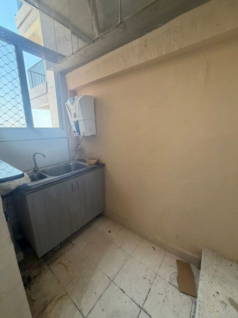 Kitchen, gaur-yamuna-city-gaur-suites 2 Bedroom 1000 Sq.Ft. Apartment In Gaur Yamuna City Greater Noida 10295091
