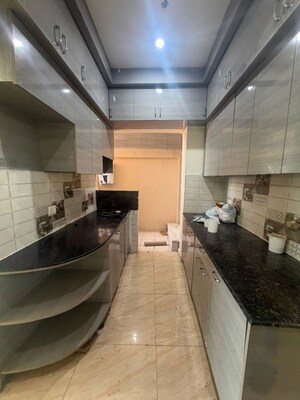 Kitchen in 2 BHK Apartment at Gaur Yamuna City Gaur Suites, Gaur Yamuna City – for Rent