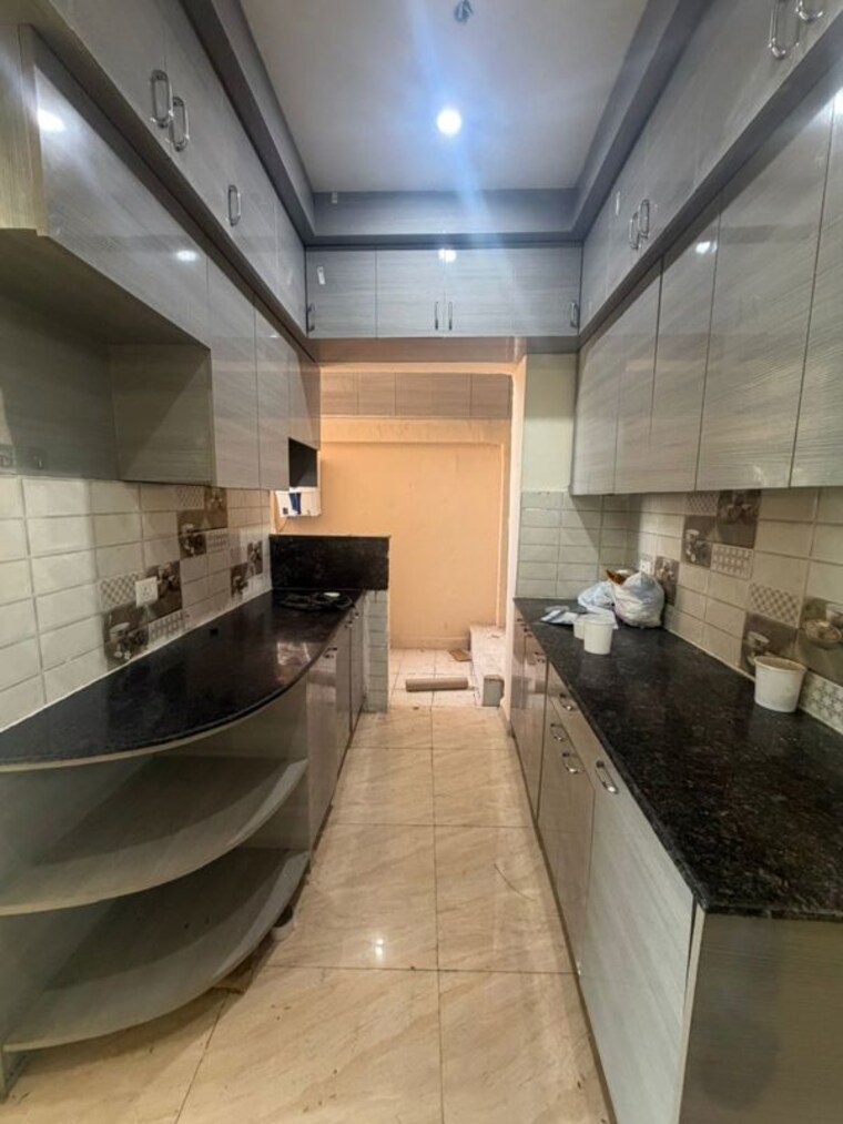Kitchen, gaur-yamuna-city-gaur-suites 2 Bedroom 1000 Sq.Ft. Apartment In Gaur Yamuna City Greater Noida 10295091