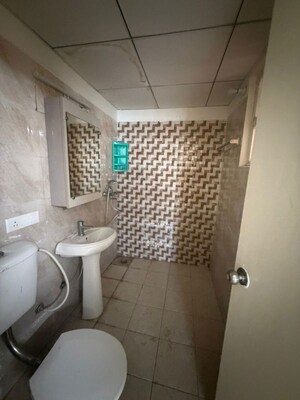 Bathroom in 2 BHK Apartment at Gaur Yamuna City Gaur Suites, Gaur Yamuna City – for Rent