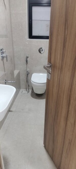 Bathroom in 1.5 BHK Apartment at Delta Meadows, Andheri West – for Sale