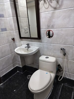 Bathroom in 3 BHK Apartment at Kailash Colony – for Sale