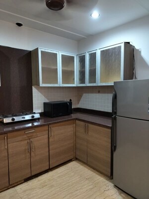 Kitchen in 3 BHK Apartment at Kailash Colony – for Sale