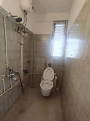 Bathroom in 3 BHK Apartment at Sanjeev Enclave, Andheri West – for Rent