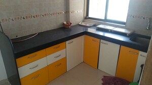 Kitchen in 2 BHK Apartment at Lodha Paradise, Majiwada – for Rent