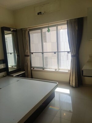 Room in 2 BHK Apartment at Romell Umiya Grandeur, Goregaon East – for Rent