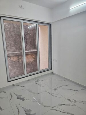 Room in 2 BHK Apartment at Atharva CHS Charai, Charai – for Sale