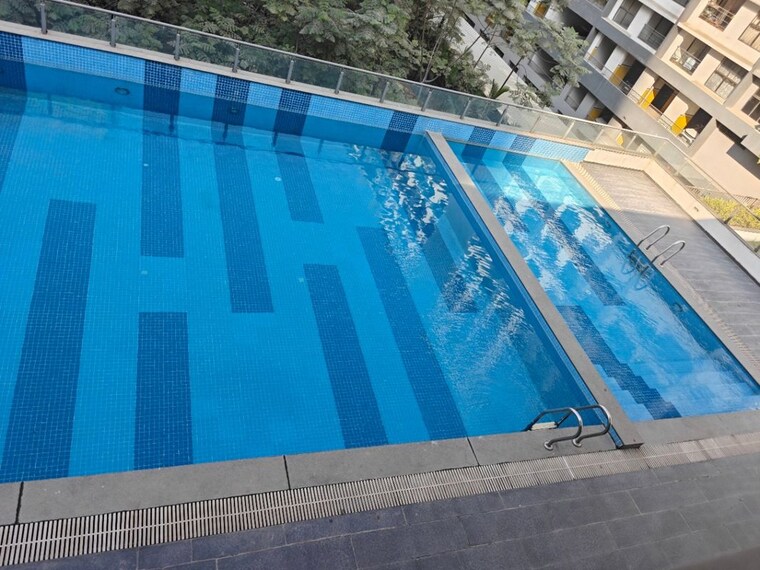 Swimming Pool, blue-bells-apartment 2 Bedroom 1000 Sq.Ft. Apartment In Pashan Pune 10295943