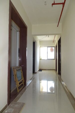 Building Lobby in 1 BHK Apartment at The Makwana Om Palace, Malad West – for Rent