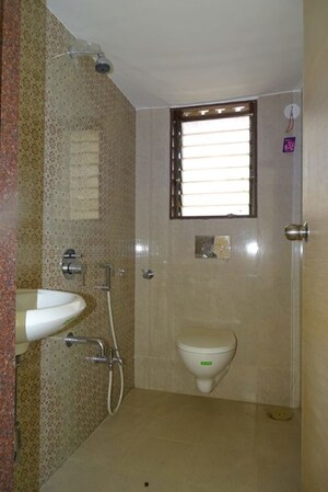 Bathroom in 1 BHK Apartment at The Makwana Om Palace, Malad West – for Rent