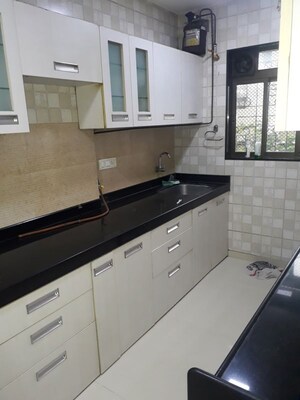 Kitchen in 1 BHK Apartment at DGS Sheetal Tapovan, Malad East – for Sale