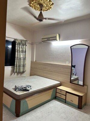 Bedroom in 2 BHK Apartment at Magarpatta Grevillea, Hadapsar – for Rent