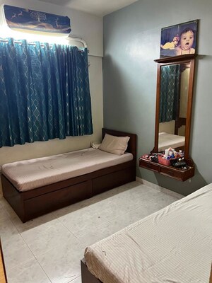 Bedroom in 2 BHK Apartment at Magarpatta Grevillea, Hadapsar – for Rent