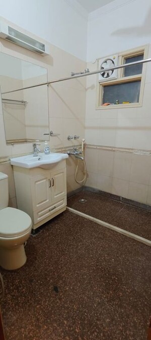 Bathroom in 3 BHK Apartment at Defence Colony – for Rent
