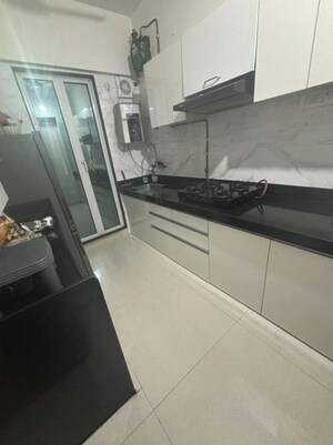 Kitchen in 2 BHK Apartment at Prestige Residency Gardenia, Ghodbunder Road – for Sale