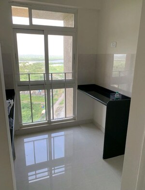 Kitchen in 1 BHK Apartment at Haware Citi, Ghodbunder Road – for Rent