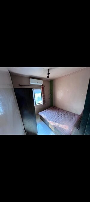 Bedroom in 1 BHK Apartment at Yashraj Park CHS, Kasarvadavali – for Rent