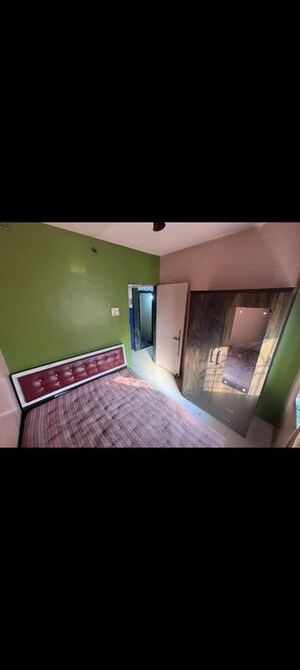 Bedroom in 1 BHK Apartment at Yashraj Park CHS, Kasarvadavali – for Rent