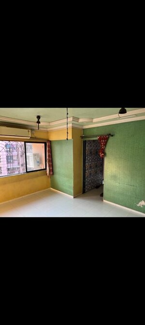 Bedroom in 1 BHK Apartment at Yashraj Park CHS, Kasarvadavali – for Rent
