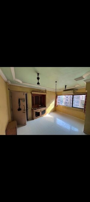 Bedroom in 1 BHK Apartment at Yashraj Park CHS, Kasarvadavali – for Rent