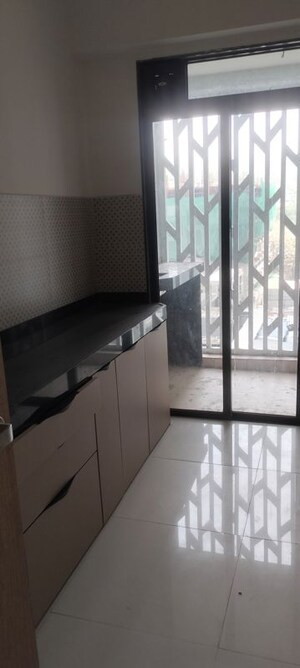 Kitchen in 3 BHK Apartment at Lodha Woods, Kandivali East – for Rent