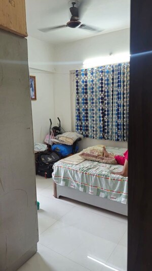 Bedroom in 2 BHK Apartment at Akshay Classic, Pimple Gurav – for Rent