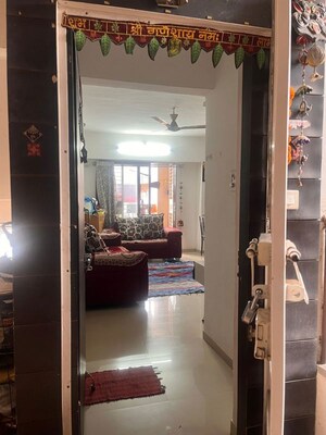 Living Room in 2 BHK Apartment at Satyam Serenity, Wadgaon Sheri – for Sale