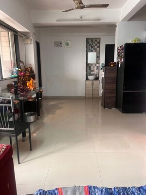 Living Room in 2 BHK Apartment at Satyam Serenity, Wadgaon Sheri – for Sale
