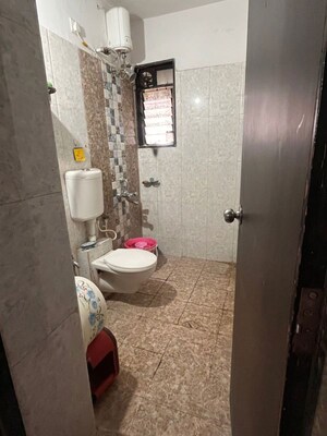 Bathroom in 2 BHK Apartment at Satyam Serenity, Wadgaon Sheri – for Sale