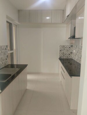 Kitchen in 2 BHK Apartment at Mana Capitol, Sarjapur Road – for Rent