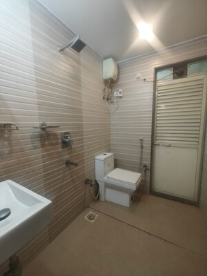 Bathroom in 2 BHK Apartment at Juhi Greens, Seawoods – for Rent