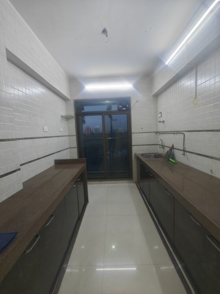 Kitchen, juhi-greens 2 Bedroom 1300 Sq.Ft. Apartment In Seawoods Navi Mumbai 10296369