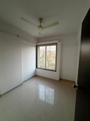 Room in 2 BHK Apartment at United Arise, Lohgaon – for Rent