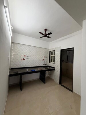 Kitchen in 2 BHK Apartment at United Arise, Lohgaon – for Rent